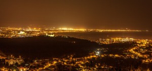 Genova property market night view.